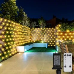 DBFAIRY 200LED Noël Net Lights 9.8X6.5FT Fil Vert Fairy Mesh Lumière Multicolore Chaîne Lumières Mémoire Minuterie Avec Télécommande,8 Modes, Waterproof Pour Noël Vacances, Clôture, Bush, Décor Mural